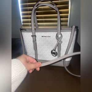 MK Grey Travel Jet Set Extra-Small Logo Top-Zip Tote Bag with Shoulder Strap.